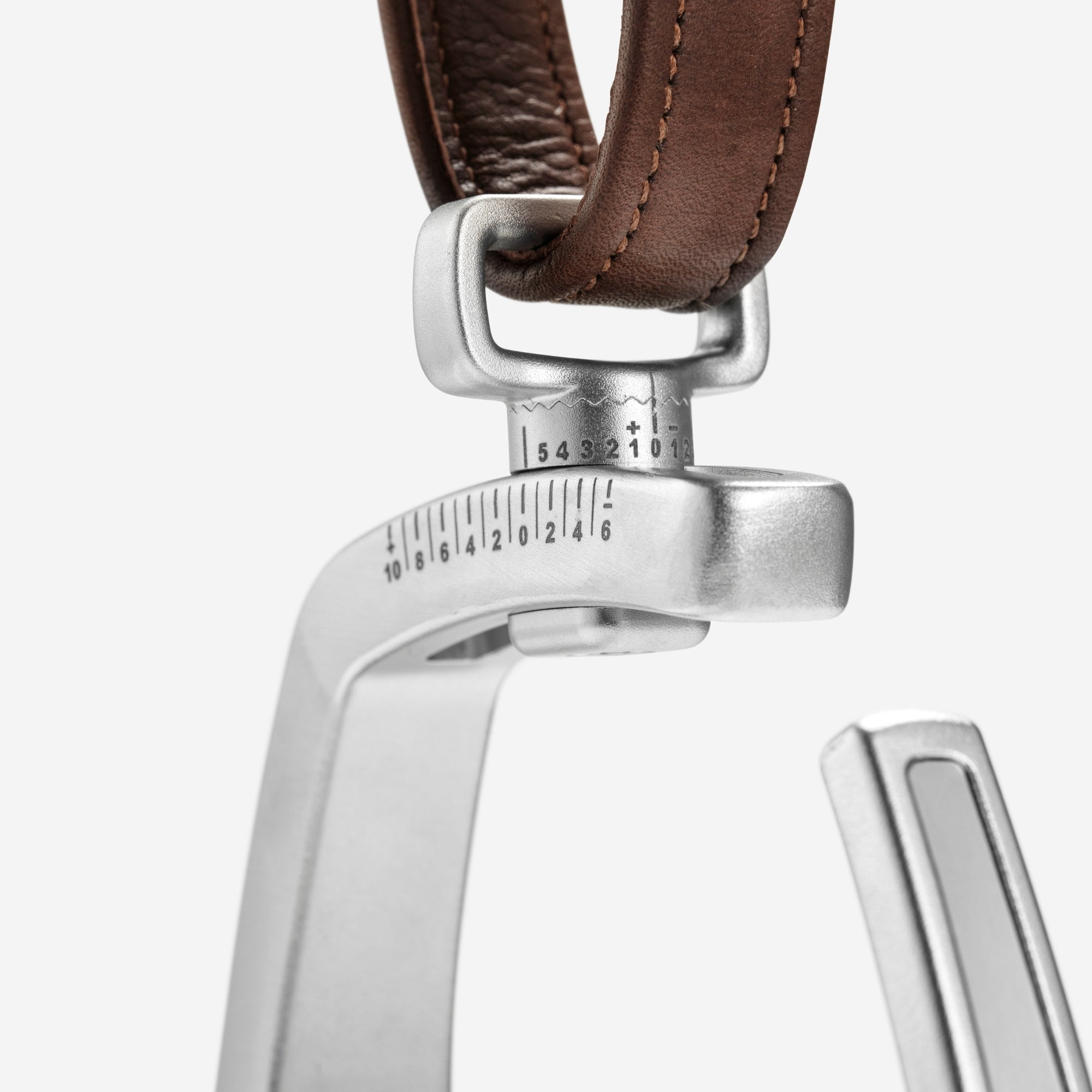 Adjustable Stirrups in Silver by RYDE - Strēid. Equestrian stirrups with magnetic safety release and adjustable design.