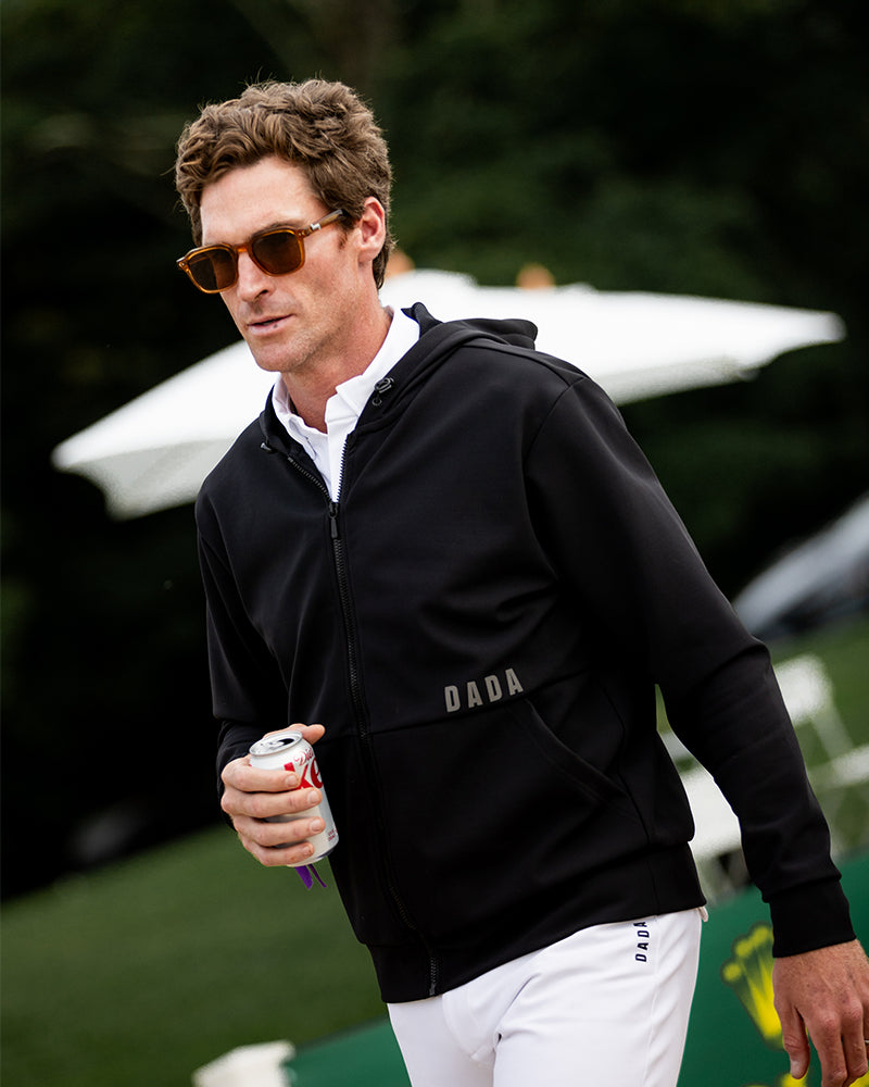 Dada Sport Dexter Hooded Softshell Riding Jacket Black - STRĒID. Unisex black riding jacket with fleece lining, water-repellent softshell, adjustable hood, and patch pockets.