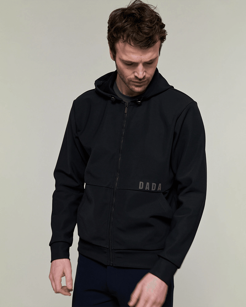 Dada Sport Dexter Hooded Softshell Riding Jacket Black - STRĒID. Unisex black riding jacket with fleece lining, water-repellent softshell, adjustable hood, and patch pockets.