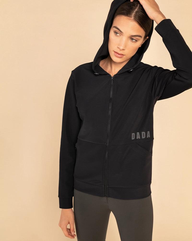 Dada Sport Dexter Hooded Softshell Riding Jacket Black - STRĒID. Unisex black riding jacket with fleece lining, water-repellent softshell, adjustable hood, and patch pockets.