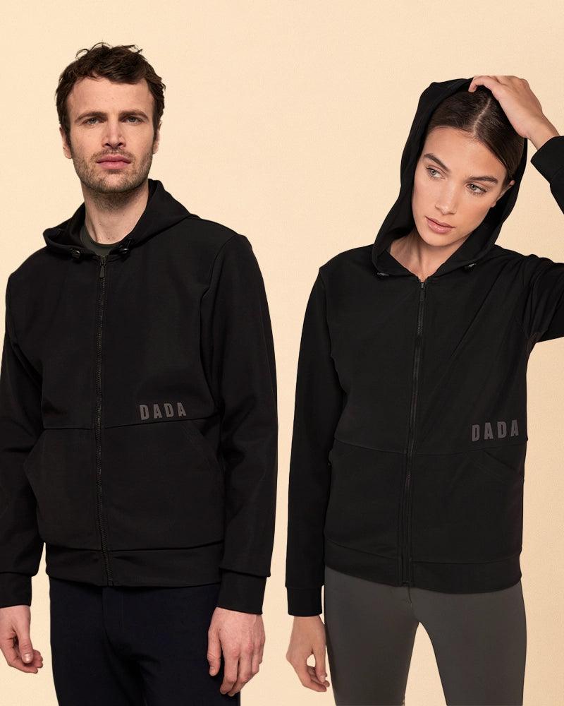 Dada Sport Dexter Hooded Softshell Riding Jacket Black - STRĒID. Unisex black riding jacket with fleece lining, water-repellent softshell, adjustable hood, and patch pockets.