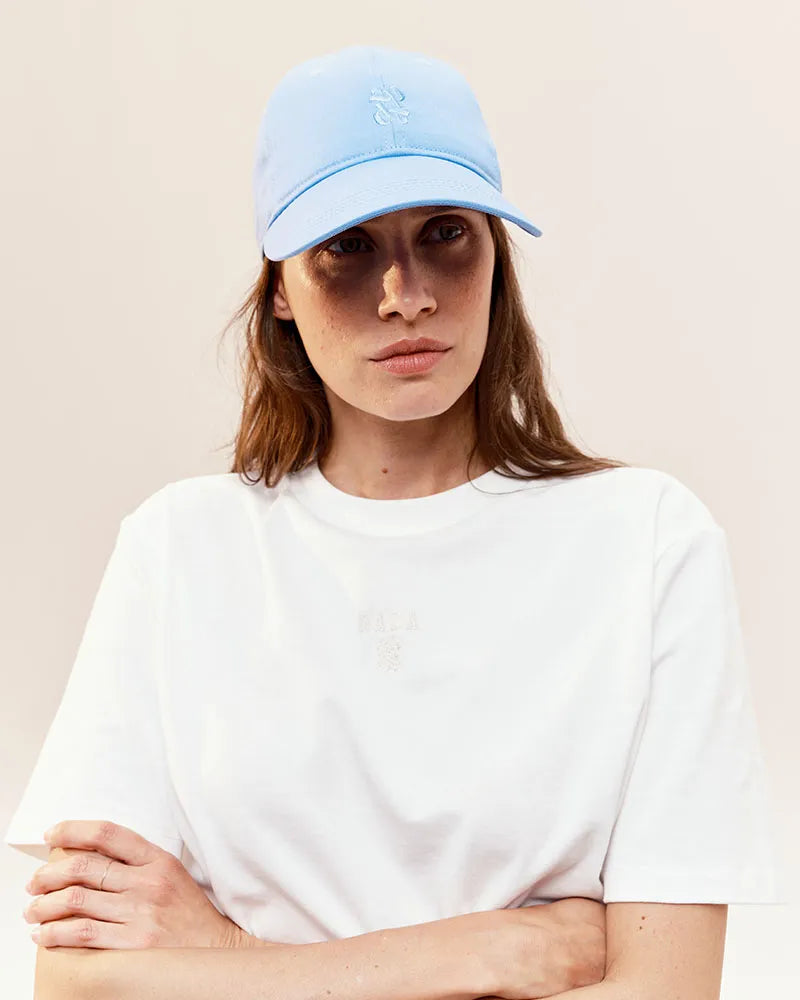 Dada Sport Equinox Unisex Cap - STRĒID. Lightweight cotton baseball cap in Cornflower, Lemonade or Jade Green with DA monogram, UPF 50+, adjustable gold buckle.