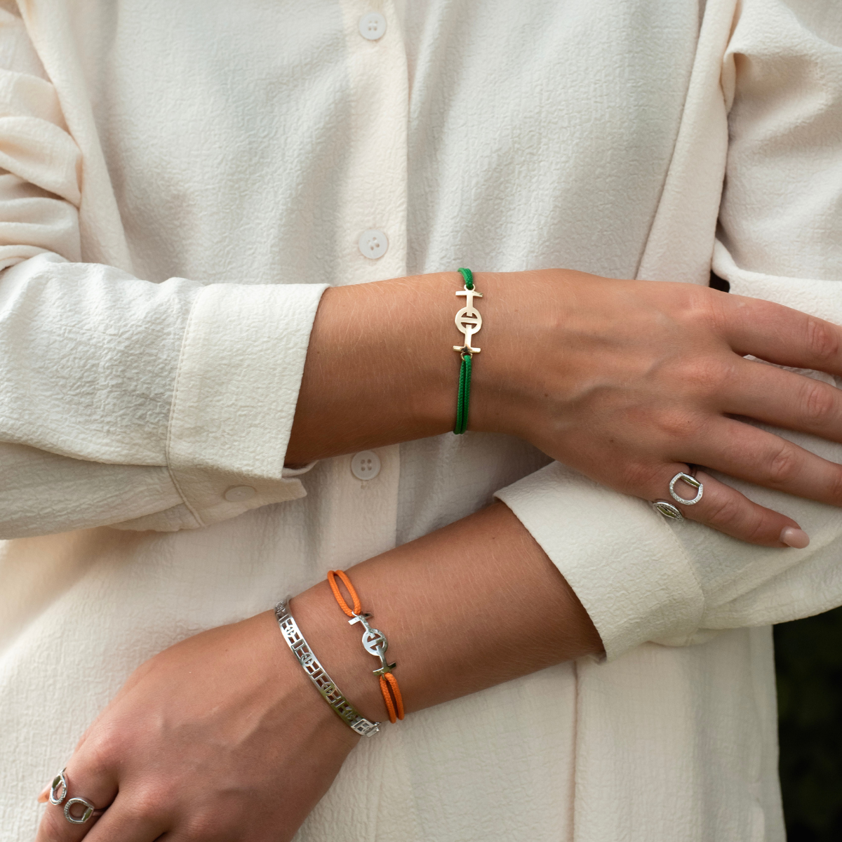 Gold 9KT Challenge Cord Bracelet in Green by TOTI - Strēid. Inspirational monogram bracelet with empowerment symbolism and vibrant green cord.