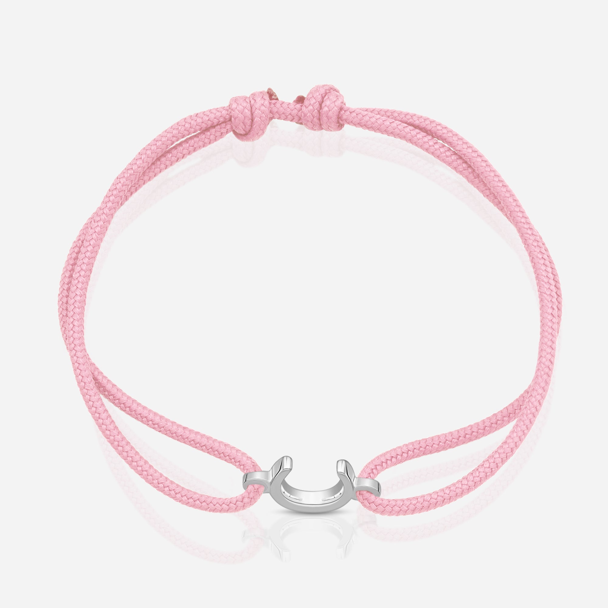 TOTI Destiny Confidence Cord Bracelet Pink - STRĒID. Adjustable pink cord bracelet with meaningful silver horseshoe luck charm.