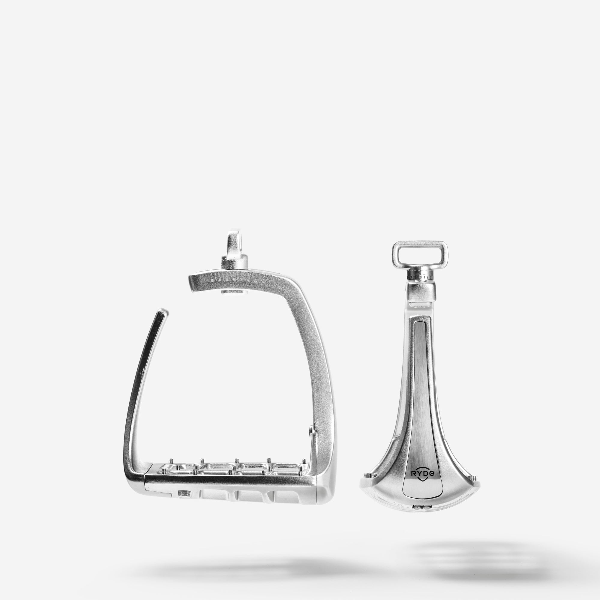 Adjustable Stirrups in Silver by RYDE - Strēid. Equestrian stirrups with magnetic safety release and adjustable design.

