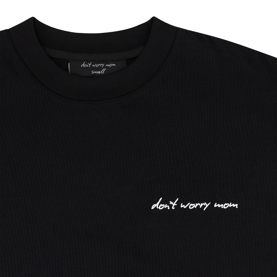 Black Oversized T - Side Logo - Don't Worry Mom – STRĒID. Relaxed fit black oversized tee with Don't Worry Mom logo.