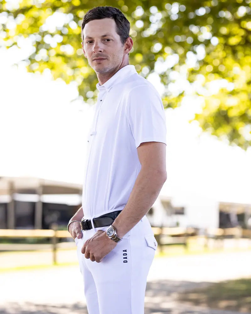 Dada Sport Blue Competition Polo Shirt - STRĒID. Short-sleeve lightweight show polo with invisible snaps, tie loop, double monogram, bi-stretch breathable Italian fabric.