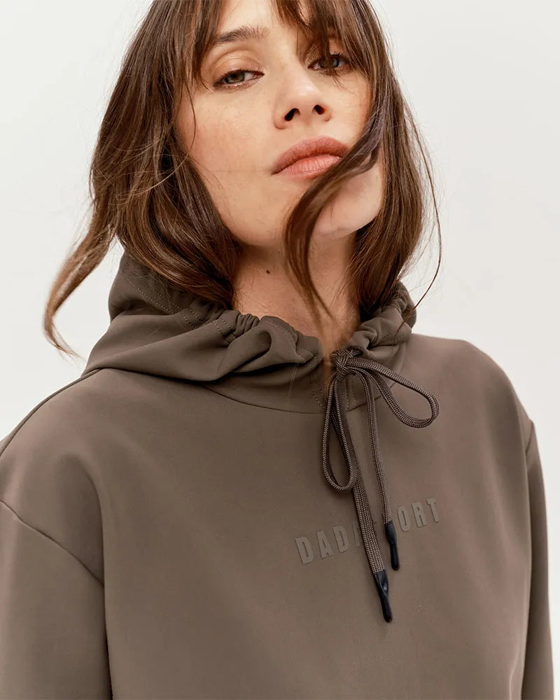 Dada Sport Luigi Hooded Riding Sweatshirt - STRĒID. Unisex technical hoodie with adjustable hood, silicone DADA logo, thermal fabric, pairs with Ghibli pants.