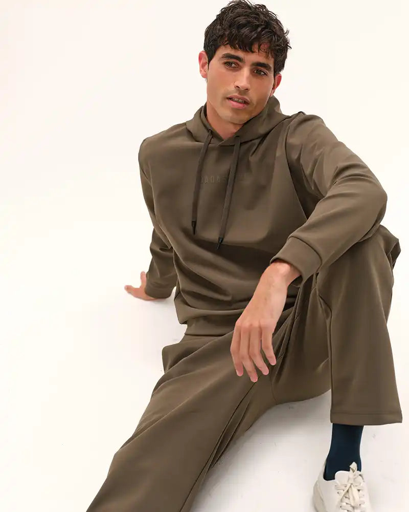 Dada Sport Luigi Hooded Riding Sweatshirt - STRĒID. Unisex technical hoodie with adjustable hood, silicone DADA logo, thermal fabric, pairs with Ghibli pants.