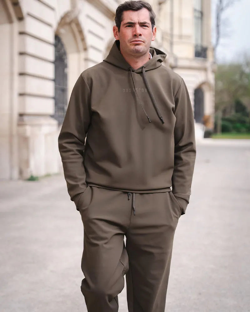 Dada Sport Luigi Hooded Riding Sweatshirt - STRĒID. Unisex technical hoodie with adjustable hood, silicone DADA logo, thermal fabric, pairs with Ghibli pants.