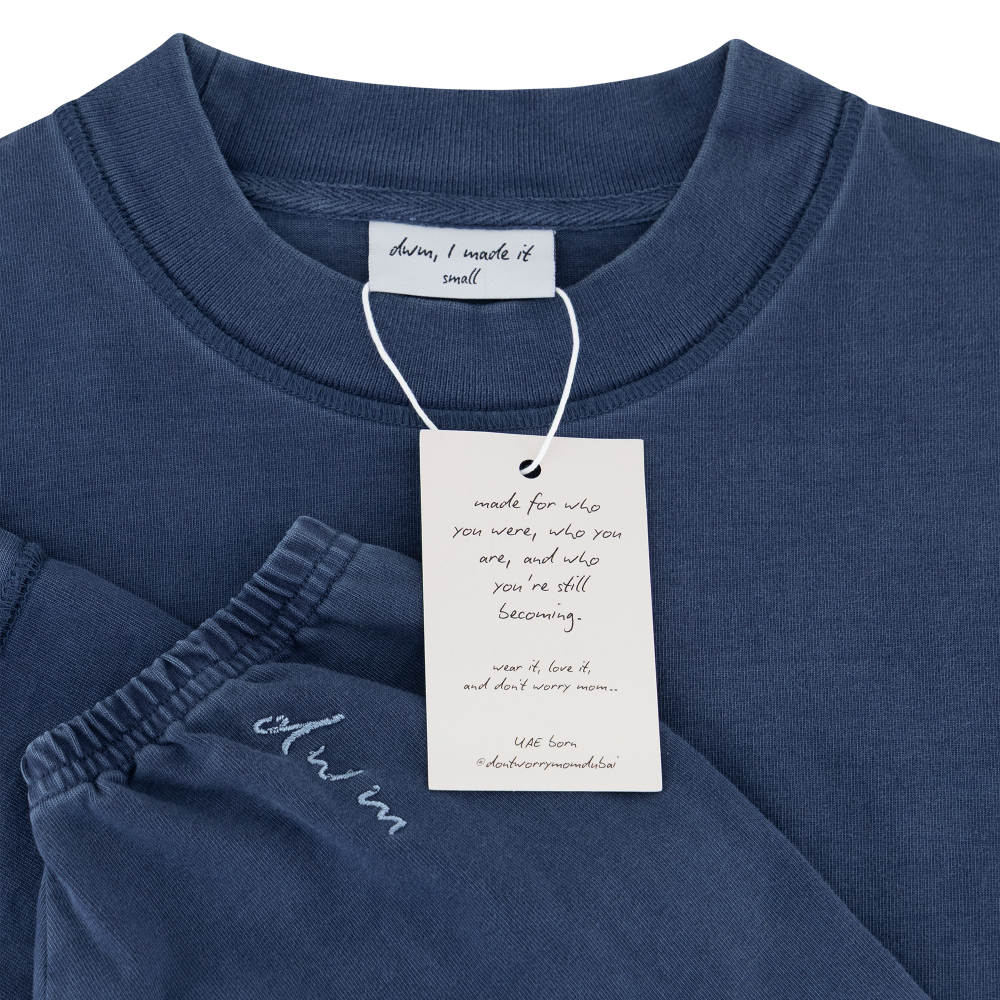 Dubai Winter Ready Long Sleeve Denim Blue - Don't Worry Mom – STRĒID. Washed denim blue long sleeve top with laid-back fit for in-between weather.