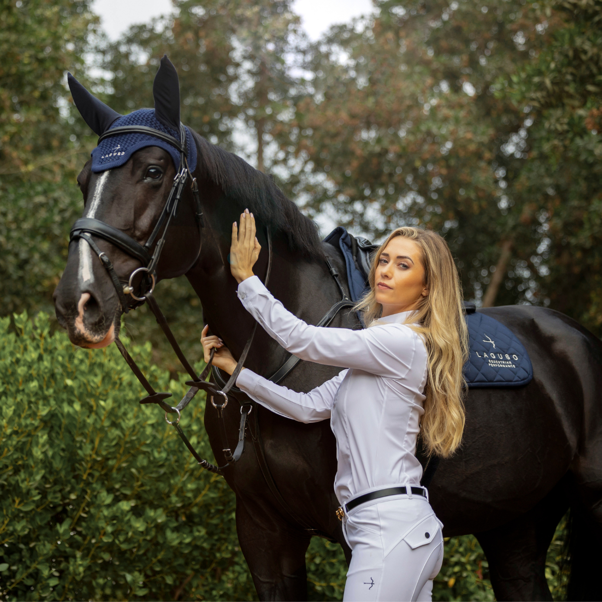 Luxury Jump Saddle Pad in Navy by LAGUSO - Strēid. Premium horse saddle pad with raw cotton filling for absorbency and comfort