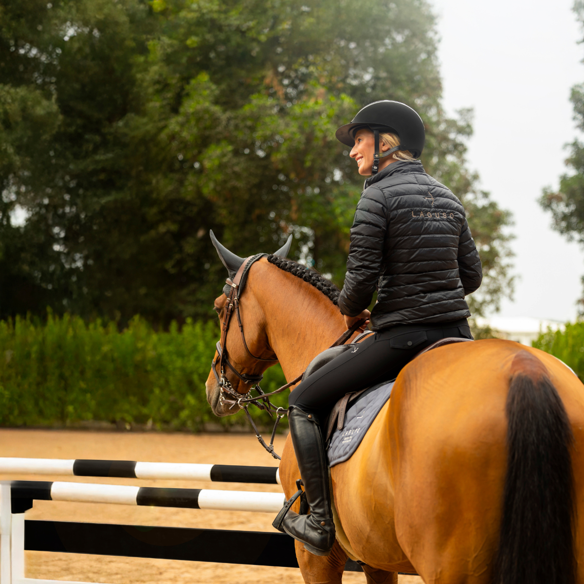 Sophia Down Jacket by LAGUSO - Strēid. Ultra-light equestrian down jacket with logo embroidery and water-repellent material
