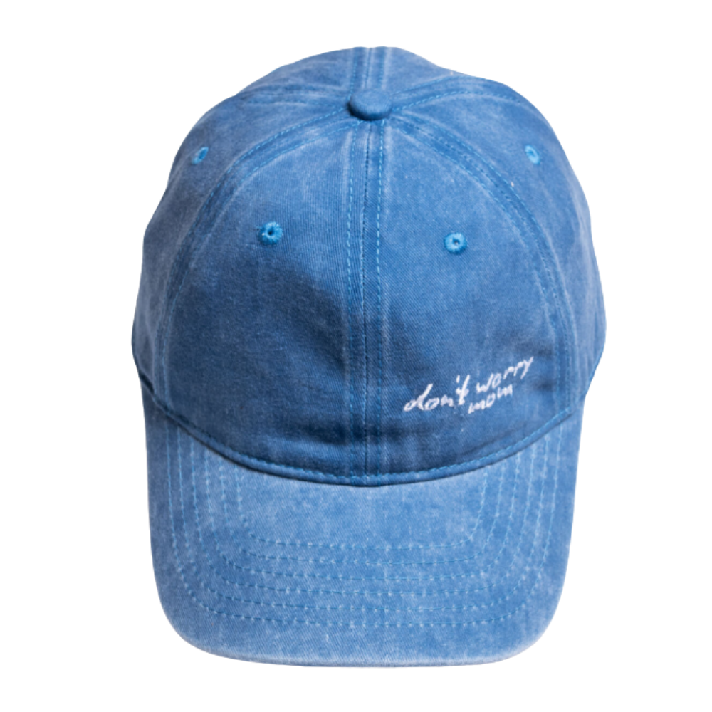 Washed Denim Cap - Side Logo - Don't Worry Mom – STRĒID. Soft vintage washed denim baseball cap with subtle side logo, designed in Dubai.