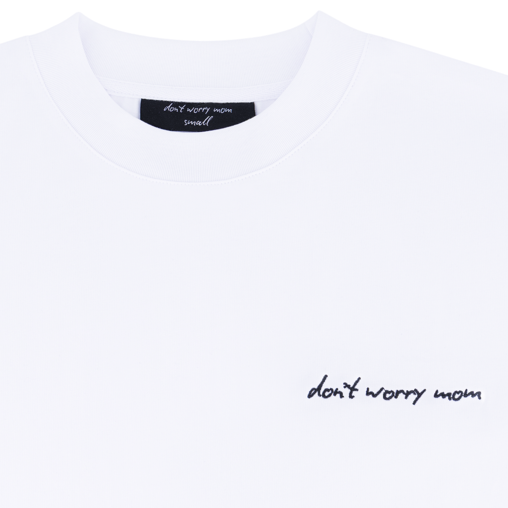 White Oversized T - Side Logo - Don't Worry Mom – STRĒID. Relaxed fit white oversized tee with Don't Worry Mom logo.